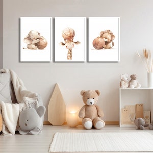 May include: Three watercolor illustrations of animals holding basketballs. An elephant, giraffe, and lion are featured in the illustrations.