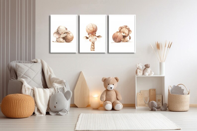 May include: Three watercolor illustrations of animals holding basketballs. An elephant, giraffe, and lion are featured in the illustrations.