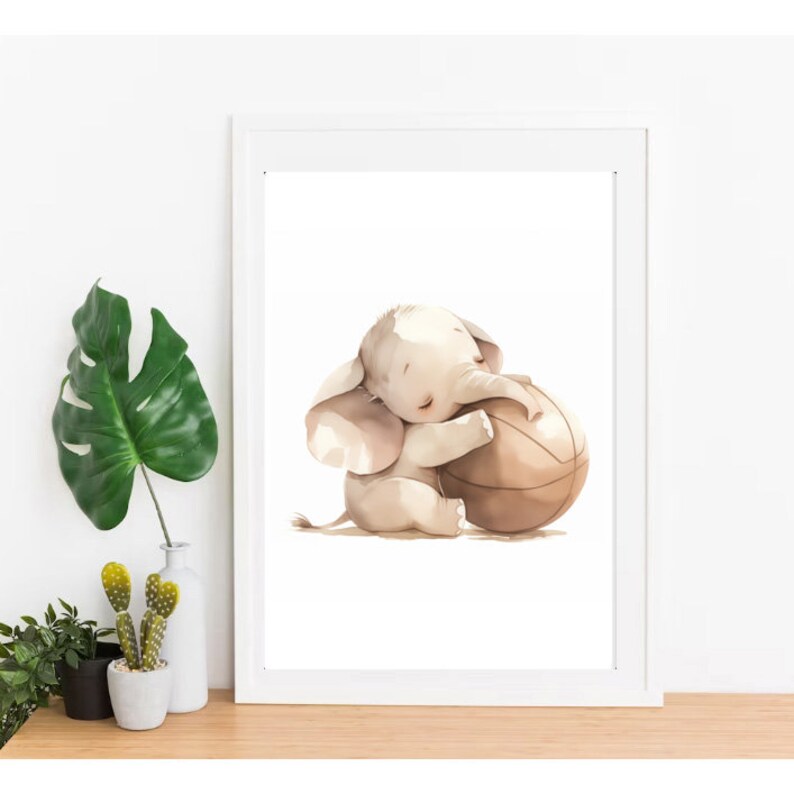 May include: A watercolor illustration of a cute elephant holding a brown basketball. The elephant is light brown with a pink nose and ears. The background is white.