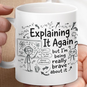 May include: White ceramic mug with the text "Explaining It Again" and humorous science-themed doodles. The mug features a cartoon figure and various scientific formulas and phrases, perfect for a science enthusiast.