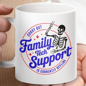 May include: White ceramic mug with the text "Sorry But Family Tech Support Is Currently Offline" in blue and red. A black skeleton graphic is also featured on the mug.