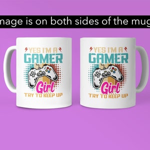 May include: White ceramic mug with a colorful graphic of a video game controller and the text "YES I'M A GAMER Girl TRY TO KEEP UP". The graphic is in a retro style with a pixelated background. The text is in a bold font. The mug is shown from both sides.