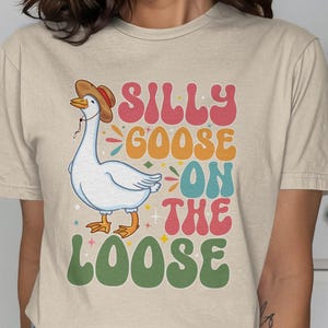 Silly Goose On The Loose Funny T-Shirt, Cute Animal Graphic Tee, Fun Cartoon Goose Shirt, Humorous Goose Lover Gift