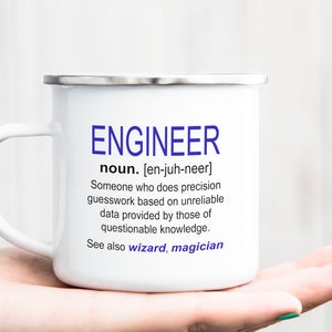 May include: White enamel mug with a silver rim and handle. The mug has a black and blue text design that reads "ENGINEER noun. [en-juh-neer] Someone who does precision guesswork based on unreliable data provided by those of questionable knowledge. See also wizard, magician"