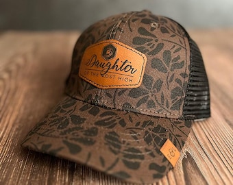 Daughter of the Most High Ponytail Hat: Christian Leather Patch Trucker Cap