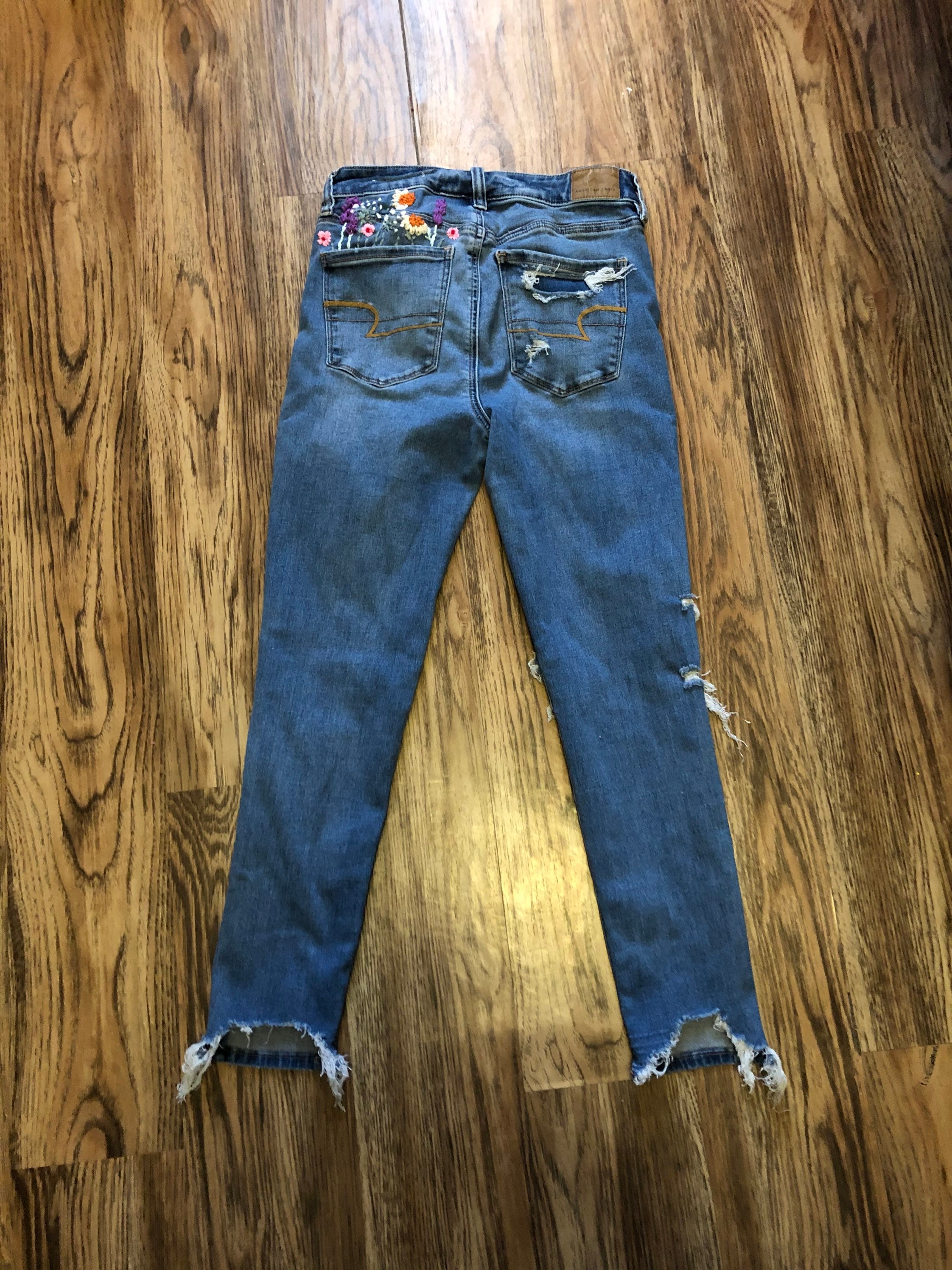 American eagle store floral jeans