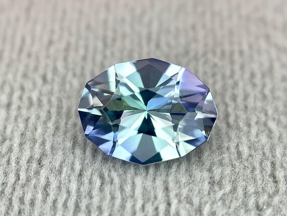 Peacock Colour  Natural Unheated Tanzanite Oval Cut Faceted Loose Gemstone Weight-2.03 Cts, Size-10x7.5 mm (VSI) #B14.24