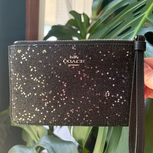 Nuevo COACH Glitter Star Cartera de mano negra con cremallera Bolso de mano Monedero de cuero negro plateado Artículos de cuero Coach