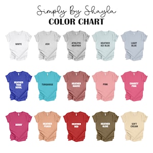 May include: Color chart showing 15 different t-shirt colors, including white, ash, athletic heather, heather ice blue, light blue, heather true royal, turquoise, heather mauve, pink, charity pink, berry, heather peach, heather red, heather olive, and soft cream.