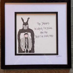 Hand drawn original artwork of Donnie Darko & Frank along with lyrics from mad World handwritten alongside