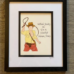 Indiana Jones hand drawn framed artwork with quote from the character handwritten alongside