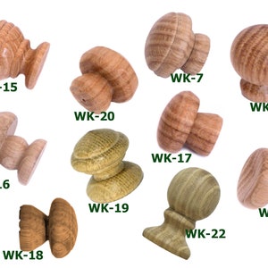May include: Assortment of 10 wooden knobs in various shapes and sizes. The knobs are made of natural wood and have a rustic finish. The knobs are labeled with the following numbers: WK-7, WK-14, WK-15, WK-16, WK-17, WK-18, WK-19, WK-20, WK-21, WK-22.