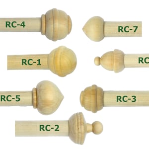 May include: Seven different wooden finials for curtain rods, labelled RC-1 through RC-7.