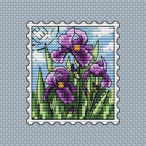 May include: A vintage-style postage stamp featuring a cluster of purple irises with yellow centers, set against a blue sky with white clouds. The flowers are surrounded by green leaves and stems.