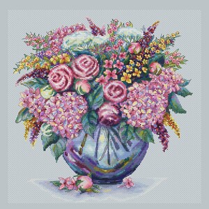 May include: A blue vase filled with a colorful bouquet of flowers, including pink roses, hydrangeas, and other blooms.