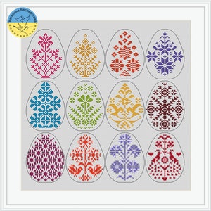 Puede incluir: Doce huevos de Pascua coloridos con diferentes diseños bordados, incluyendo flores, pájaros y patrones geométricos.