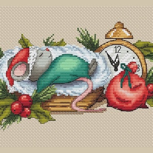 May include: A gray mouse wearing a red Santa hat sleeps in a white, fluffy bed next to a gold alarm clock set to 12:00. A red bag with a green ribbon sits next to the clock. Green holly leaves and red berries surround the scene.