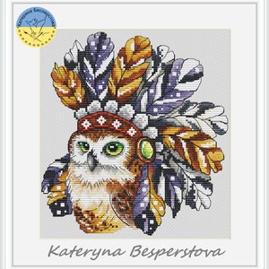 May include: Cross-stitch pattern of an owl wearing a colorful headdress with feathers. The owl has brown and white feathers and green eyes. The headdress is made of red, orange, yellow, purple, and black feathers. The text "Kateryna Besperstova" is at the bottom of the image.