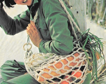 May include: A woman wearing a green jacket and yellow rain boots carries a white crocheted net bag filled with oranges and green leafy vegetables.