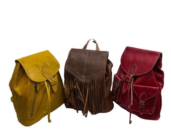 Set of three Backpacks entirely in real leather 100% handmade yellow brown and red high-end.