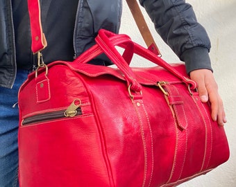 High-end genuine leather travel bag in Red color, 100% handmade.