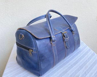 Travel bag in real blue leather, 100% handmade, high quality.