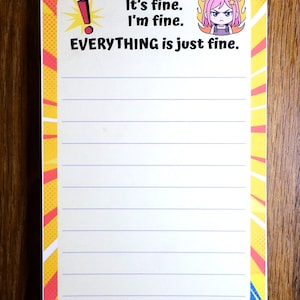 May include: A lined notepad with the text "It's fine. I'm fine. EVERYTHING is just fine." in black font. The notepad has a yellow border with red and blue accents and a cartoon image of a character with pink hair.