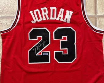 MICHAEL JORDAN Autographed Red Chicago Bulls Jersey With Certificate of Authenticity Hologram! The Goat!!!!