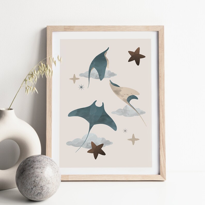 May include: A framed print with a beige background featuring four blue manta rays flying in a formation with brown starfish and clouds.