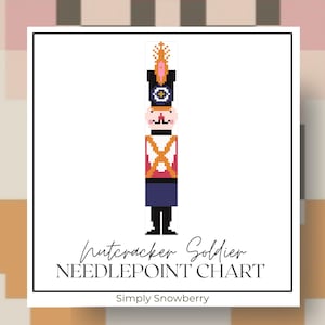 May include: A pixel art style nutcracker soldier graphic centered on a white background. The soldier wears a black hat with a gold plume, a red jacket with orange cross straps, and blue trousers. Text reads: Nutcracker Soldier NEEDLEPOINT CHART Simply Snowberry.