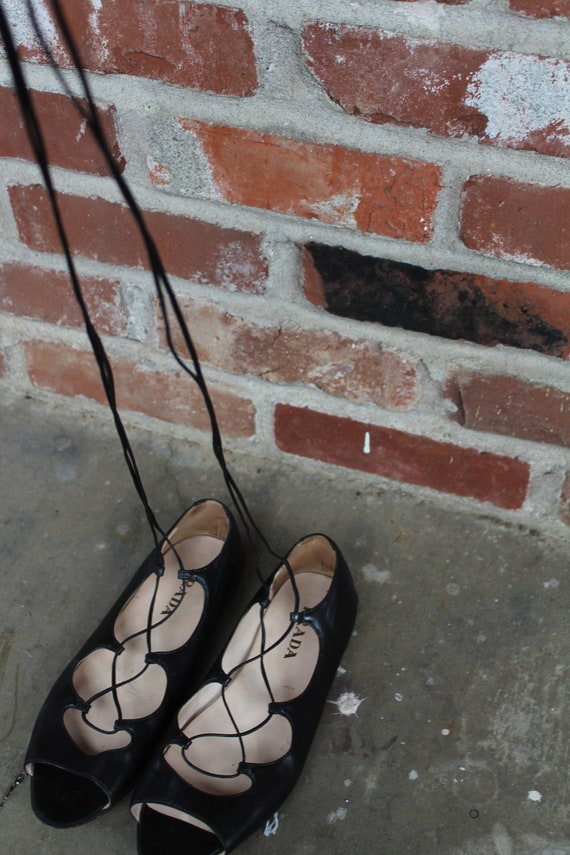 Prada lace up flats