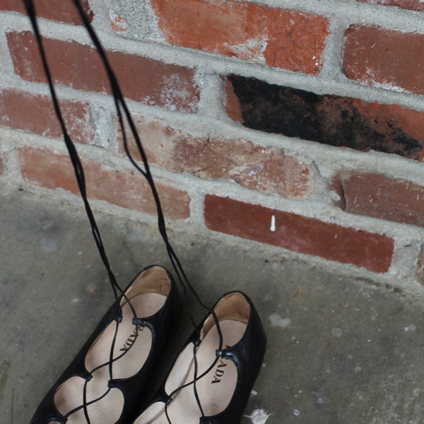 Prada lace up flats