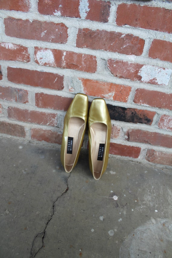 stuart weitzman gold wedges