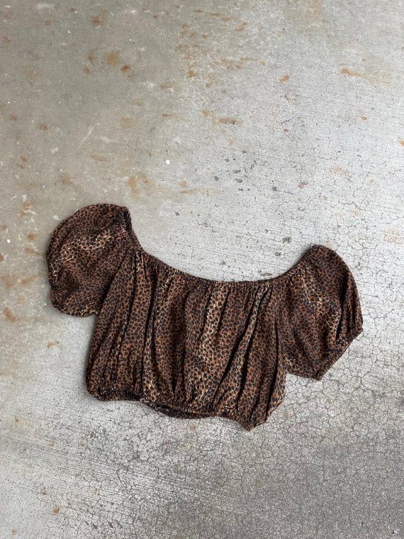 Ruffle Neck Cheetah Peplum Blouse