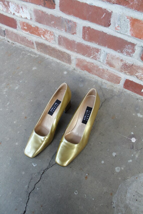 stuart weitzman gold wedges