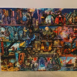 May include: A colourful diamond painting depicting a fantasy scene with a variety of buildings, trees, and creatures. The painting is made up of small, colourful diamonds that are arranged in a mosaic pattern.