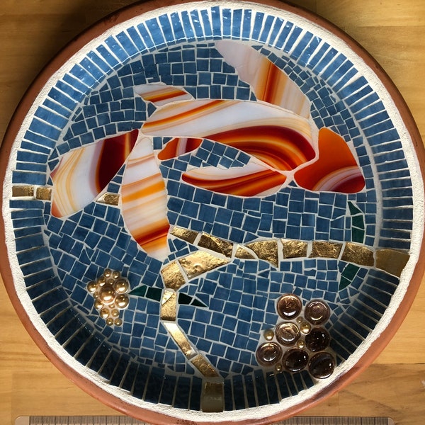 Mosaic garden bird feeder or bird bath featuring a goldfish