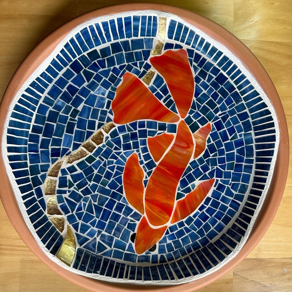 Mosaic bird bath or bird feeder featuring a goldfish with a touch of gold