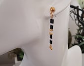 Boucles d'oreilles longues noires et dorées, bijou pour femme