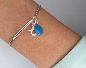 Bracelet demi jonc et chaîne argentée, signe astrologique et perle turquoise