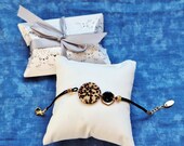 Bracelet intercalaire rond marron moucheté,