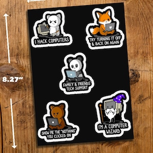 May include: A set of five black and white stickers featuring cartoon animals with computers. The stickers are on a black background and have white outlines. The text on the stickers reads: "I hack computers", "Try turning it off & back on again", "Family & friends tech support", "Show me the 'nothing' you clicked on", and "I'm a computer wizard".