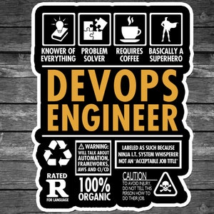 May include: A black and white sticker with the text "DevOps Engineer" in yellow. The sticker has a warning label that says "Will talk about automation, frameworks, AWS and CI/CD". It also has a label that says "Labeled as such because Ninja I.T. System Whisperer not an "Acceptable Job Title"".