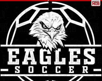 May include: Black and white graphic design of a soccer ball with an eagle head inside. The text "EAGLES - SOCCER -" is below the ball.