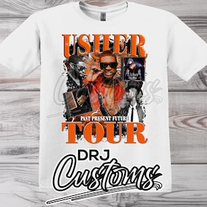 Può includere: Maglietta bianca con una grafica arancione del "Past Present Future Tour" di Usher con un collage di immagini di Usher. Il testo "DRJ Customs" è in nero in basso.