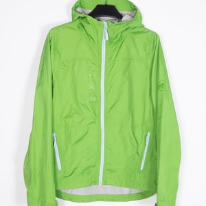 May include: A bright green hooded jacket with a light blue zipper and a logo on the left chest. The jacket has two zippered pockets on the front.