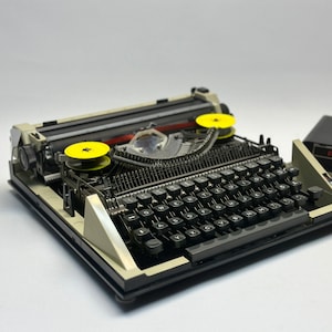 Uncover Rarity with the Privileg 150 T Typewriter - Black Cover, QWERTZ Keyboard, Antique 1960 Model