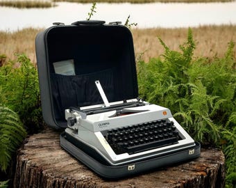 Vintage Olympia Monica Typewriter - Classic Manual Machine for Writers