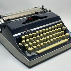 German-Made Navy Blue Triumph Typewriter w/ Cream Accents, QWERTZ Keyboard, European Craftsmanship, Leather Bag - Vintage Typewriter