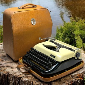 Erika 10 Typewriter with Beige Cover & Black Body - Premium Vintage Manual Typewriter | The Ultimate Gift for Writers and Collectors